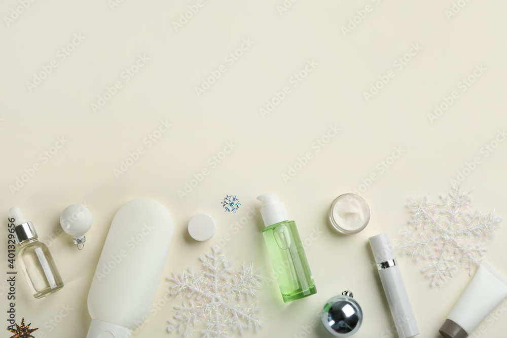 Flat lay composition with different cosmetic products on beige background, space for text. Winter care Flat lay composition with different cosmetic products on beige background, space for text. Winter care