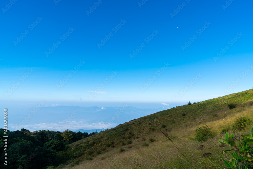 Fototapeta premium beautiful mountain layer with clouds and blue sky