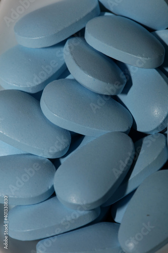Blue medical pills close up modern background high quality prints