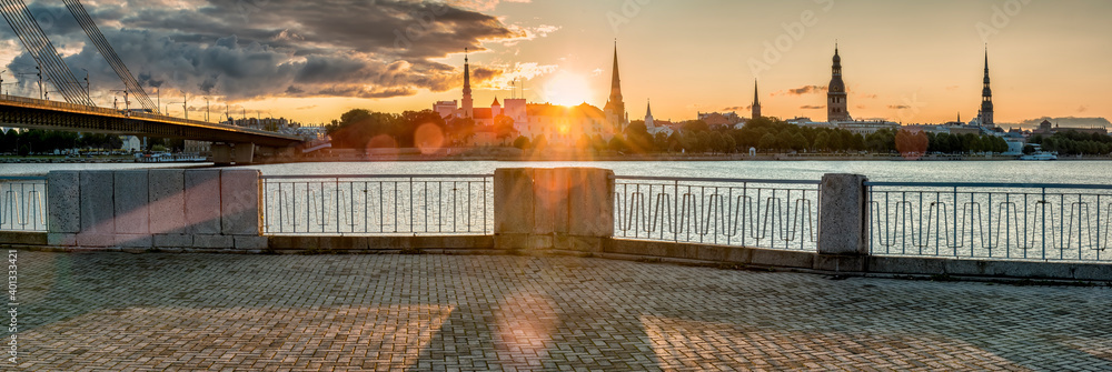 Panoramic image depicting historical district of Riga - the capital city of Latvia, it offers for tourists many resting opportunities and unique medieval and Gothic architecture - obrazy, fototapety, plakaty 