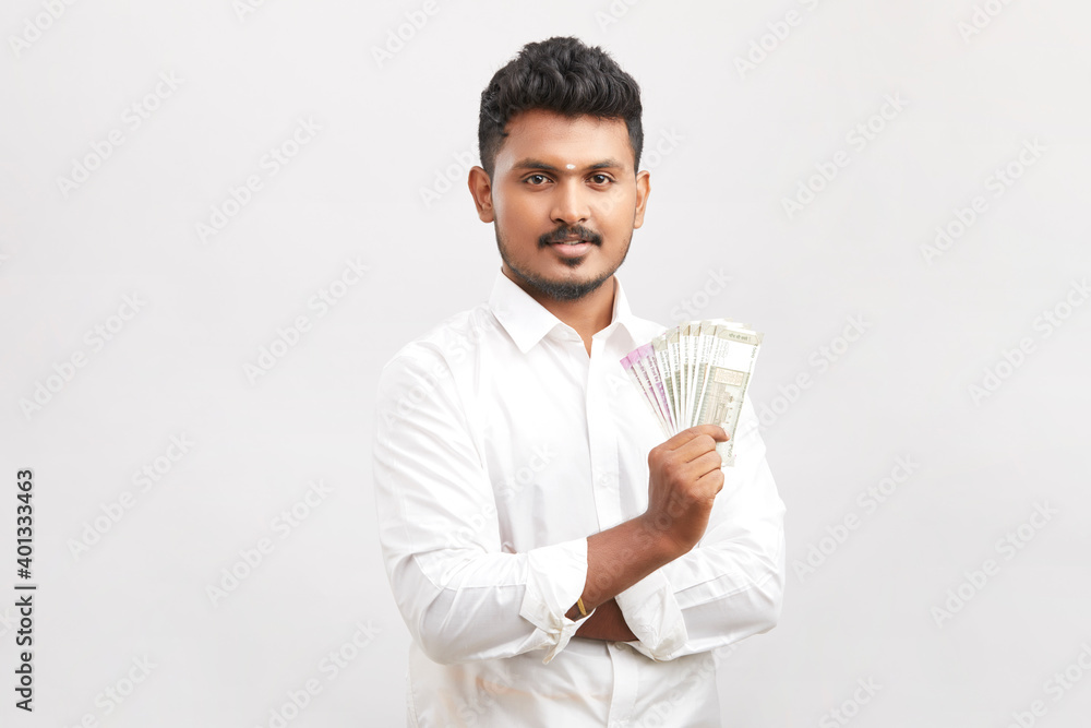 Indian traditional business man with Indian currency Indian traditional business man with Indian currency
