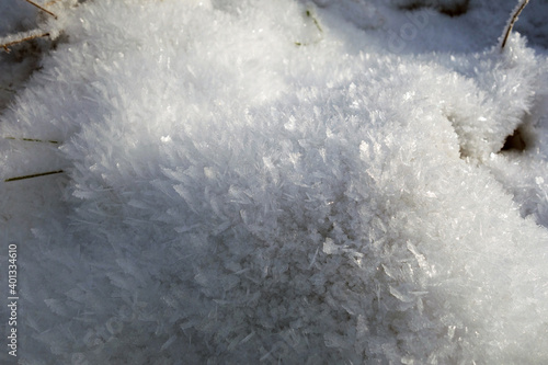 Beautiful snow crystals in the picturesque nature in the winter season
