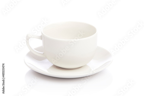 White ceramic cup and saucer on white.