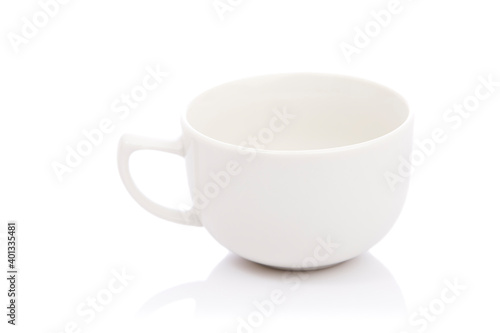 White ceramic cup and saucer on white.