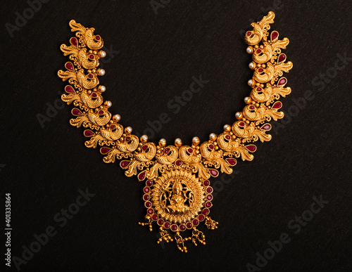 Фотография Indian traditional wedding Jewelry on black.