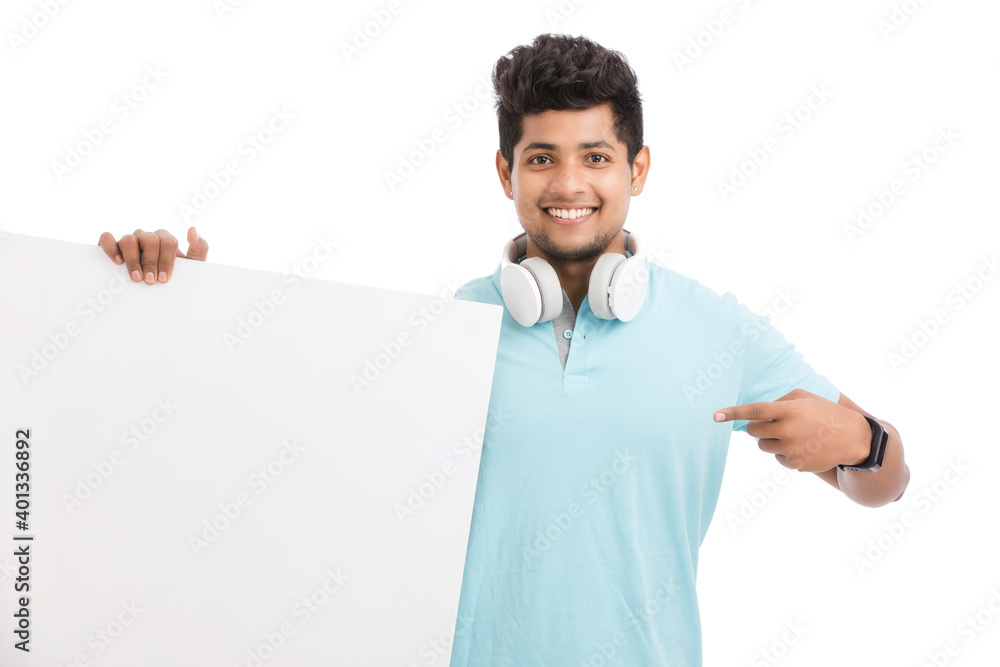 Smart young man holding white board isolated on white. Smart young man holding white board isolated on white.