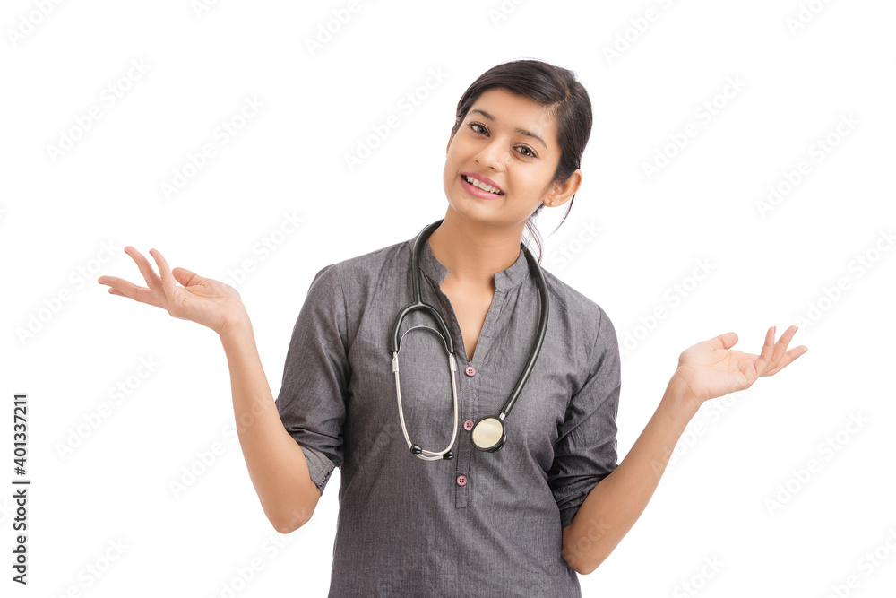Attractive smiling young Indian female doctor greeting on white background. Attractive smiling young Indian female doctor greeting on white background.