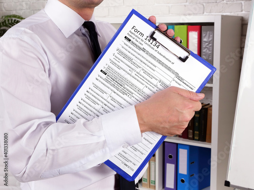 Slika na platnu Financial concept meaning  Form 14134 Application for Certificate of Subordination of Federal Tax Lien  with phrase on the sheet