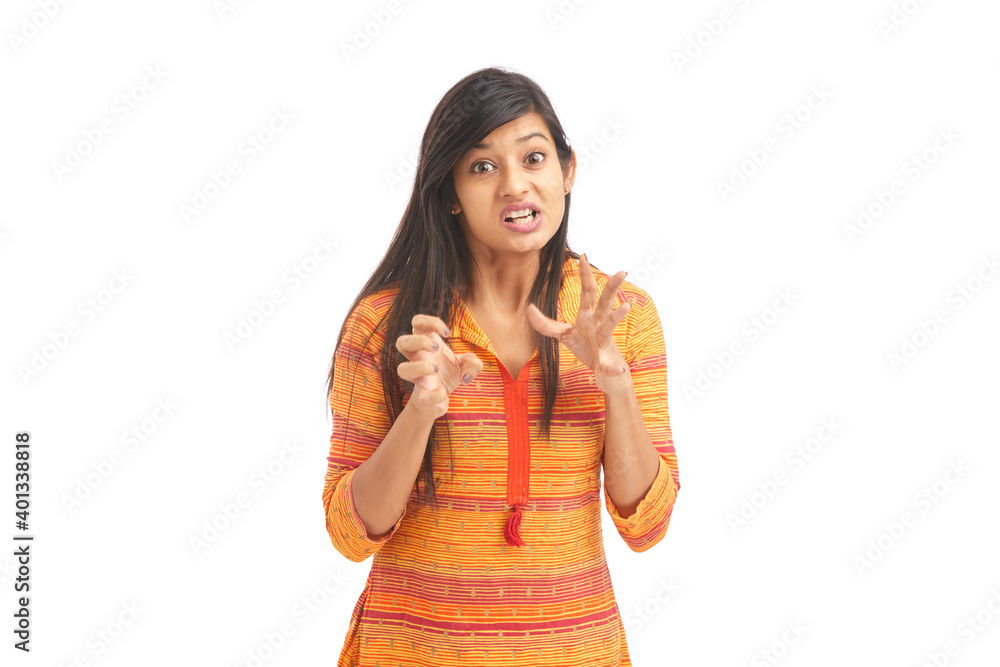 Beautiful young women posing with handbag against white background. Beautiful young women posing with handbag against white background.