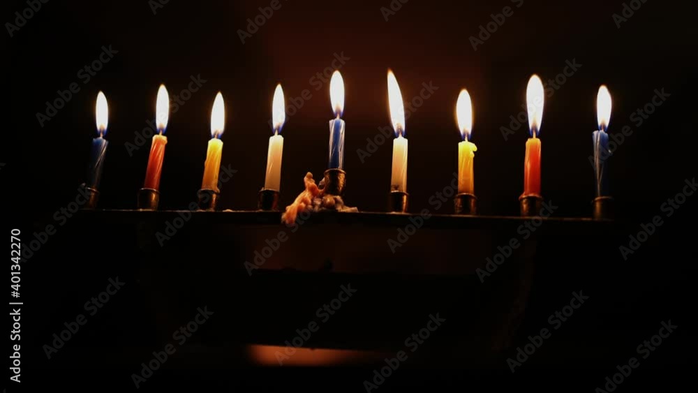 Hanukkah menorah (chanukiah) burning on the last night of the holiday Hanukkah menorah (chanukiah) burning on the last night of the holiday