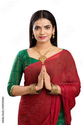 Photography Indian young pretty girl greeting isolated on white.