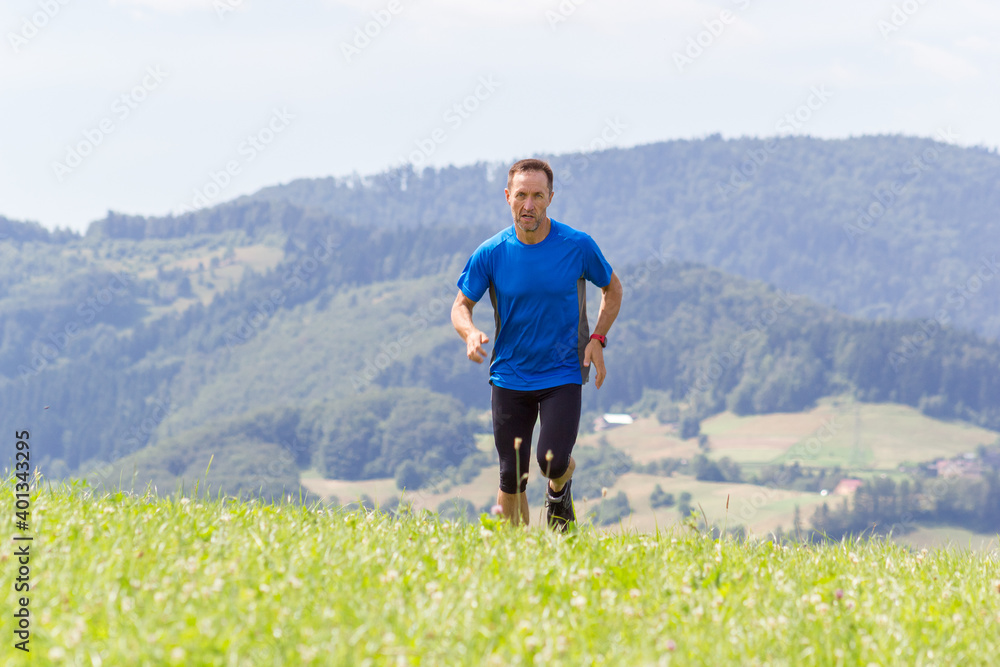 Man running at mountain background Man running at mountain background