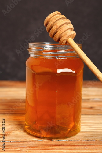 Jar of Honey with Honey Dipper