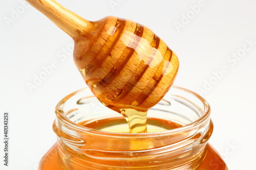 Jar of Honey with Honey Dipper photo