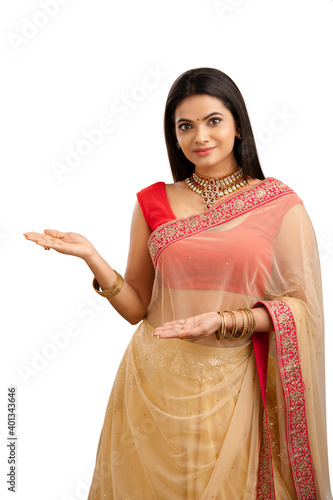 Photography Indian young Muslim girl greeting isolated on white.