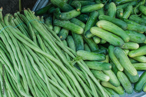 Fresh vegetables, Long beans, cucumber in local markets in Thailand.