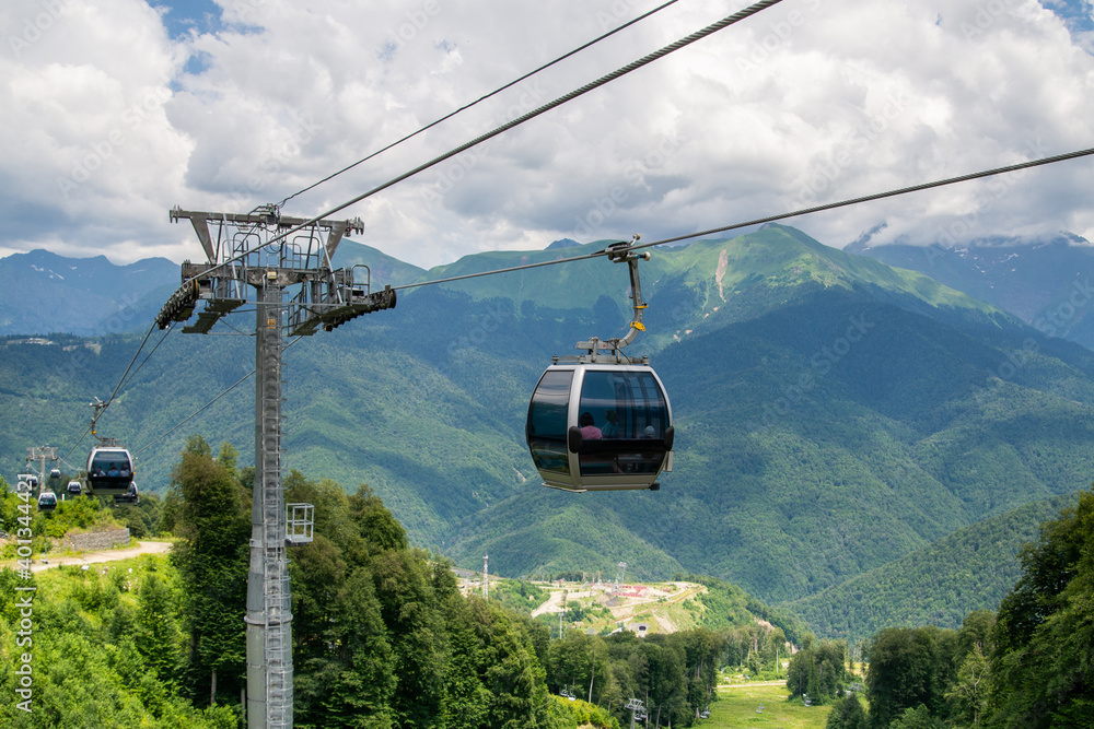 Cable car or cable railway in summer mountains