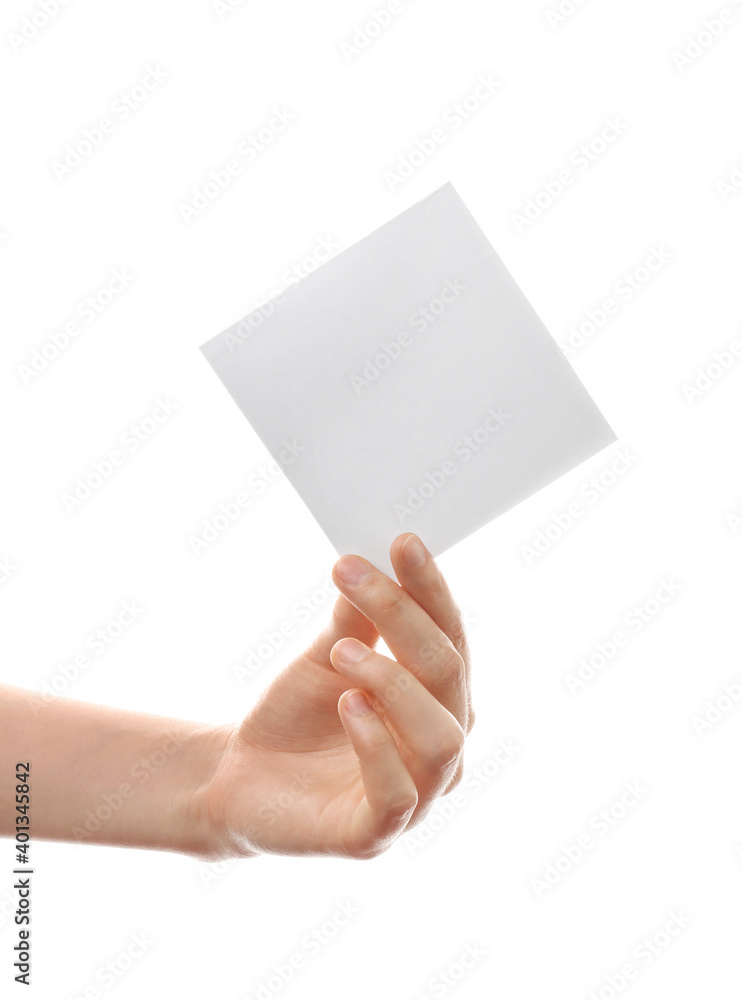 Female hand with blank paper sheet on white background Female hand with blank paper sheet on white background