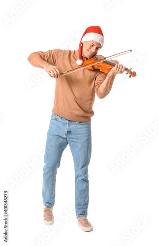 Young man playing violin on...
