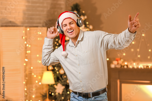 Young man listening to Chri...