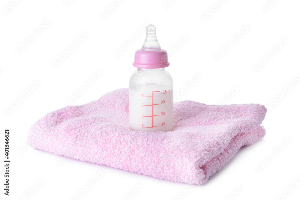 Bottle of milk for baby and towel on white background Bottle of milk for baby and towel on white background