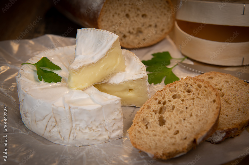 Camembert cheese on a wooden background, High quality photo