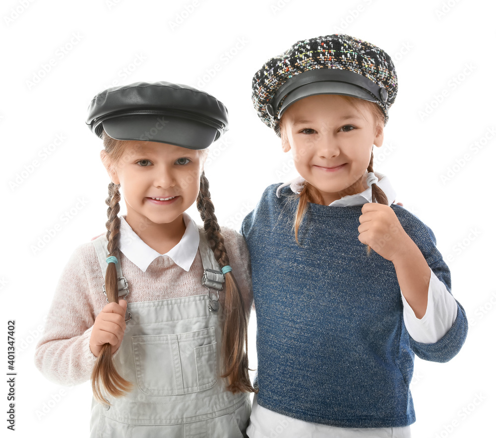 Portrait of stylish little girls on white background Portrait of stylish little girls on white background