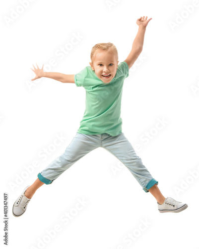 Jumping little girl on white background