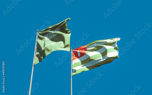 Flags of Saudi Arabia and Abkhazia.