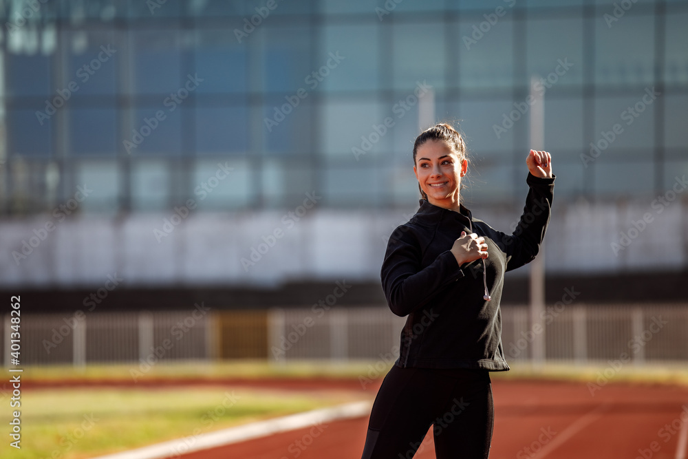 Exercising at stadium, looking fit. Exercising at stadium, looking fit.