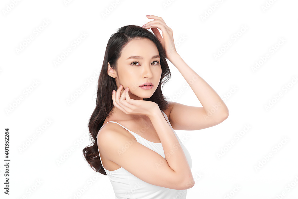 Beautiful Young asian Woman with Clean Fresh Skin, on Pink background, Face care, Facial treatment. Cosmetology, beauty and spa. Asian women portrait Beautiful Young asian Woman with Clean Fresh Skin, on Pink background, Face care, Facial treatment. Cosmetology, beauty and spa. Asian women portrait