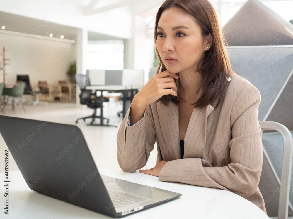 ฺBusinesswoman female manager supervisor company office look at camera work computer notebook pad tablet near coffee cup morning for conference meeting online digital marketing technology customer ฺBusinesswoman female manager supervisor company office look at camera work computer notebook pad tablet near coffee cup morning for conference meeting online digital marketing technology customer
