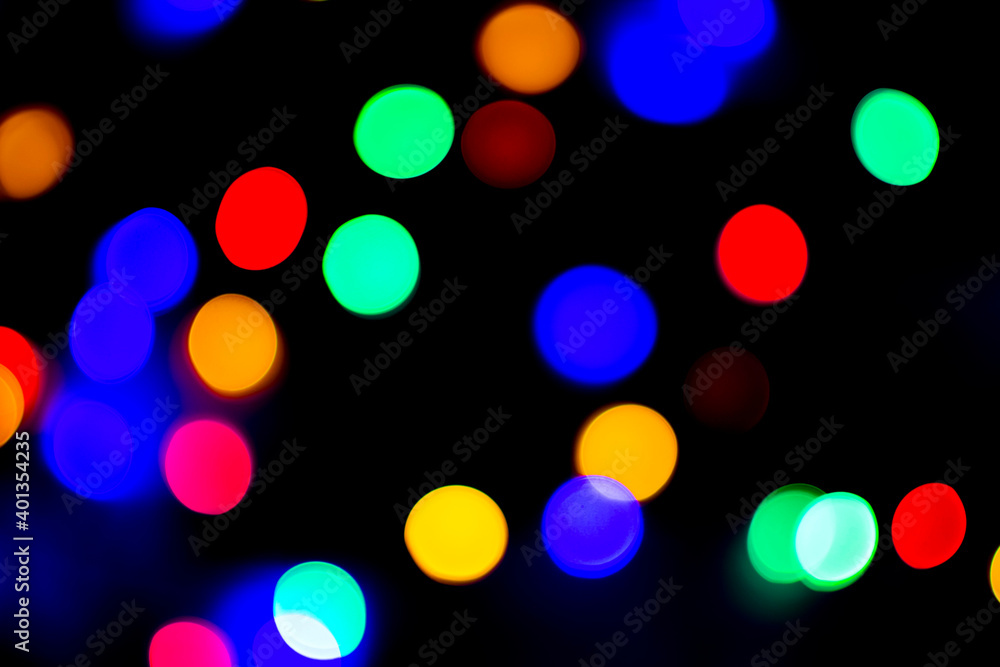 Multi color bokeh. Defocused lights background for Christmas, New Year, Holiday card.