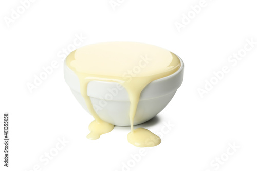 Fotografie Bowl with condensed milk isolated on white background