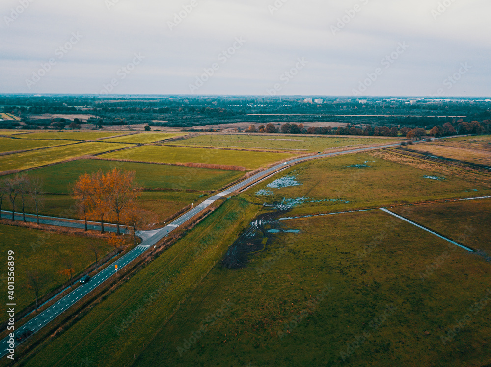 Aerial drone shot of the countryside road in the Netherlands
