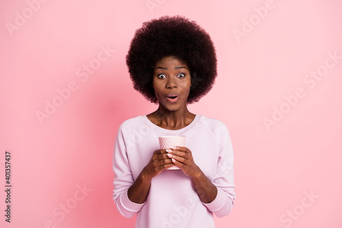 Portrait of pretty cute funny amazed cheery wavy-haired girl drinking aromatic latte pout lips isolated over pink pastel color background