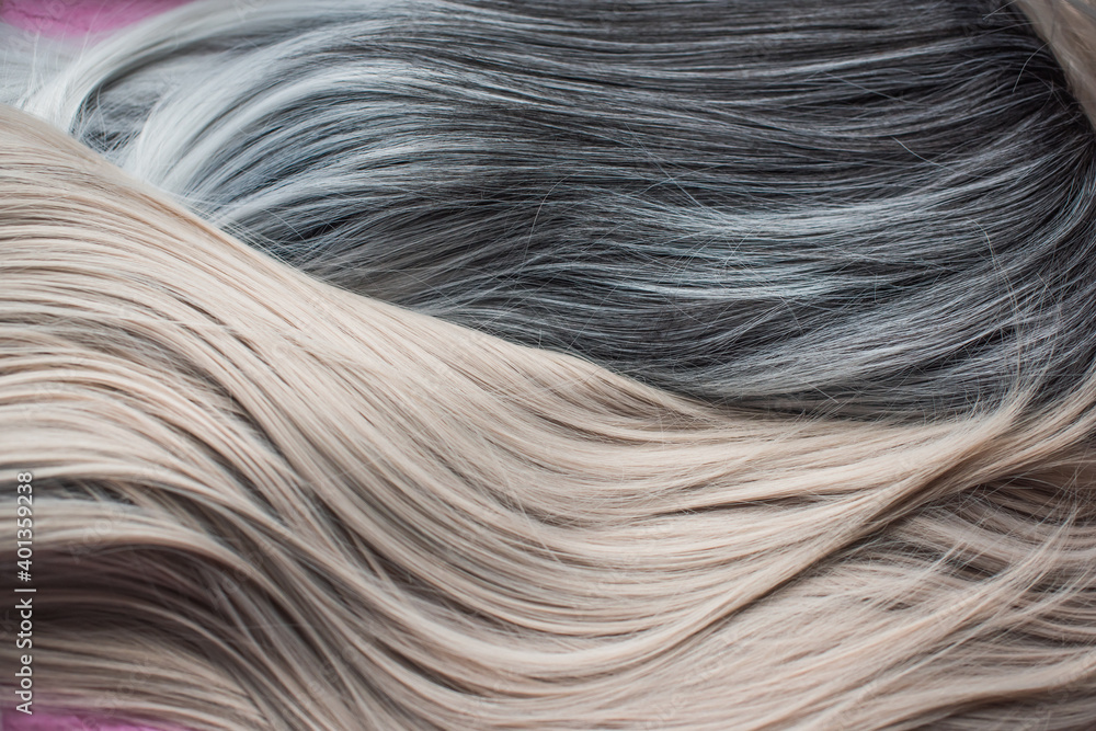 Wigs, natural and synthetic hair. Women's beauty concept. Close up photo of wig, hair for ladies Wigs, natural and synthetic hair. Women's beauty concept. Close up photo of wig, hair for ladies