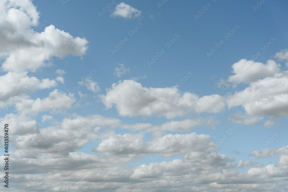 Blue sky with beautiful and fluffy white clouds Blue sky with beautiful and fluffy white clouds