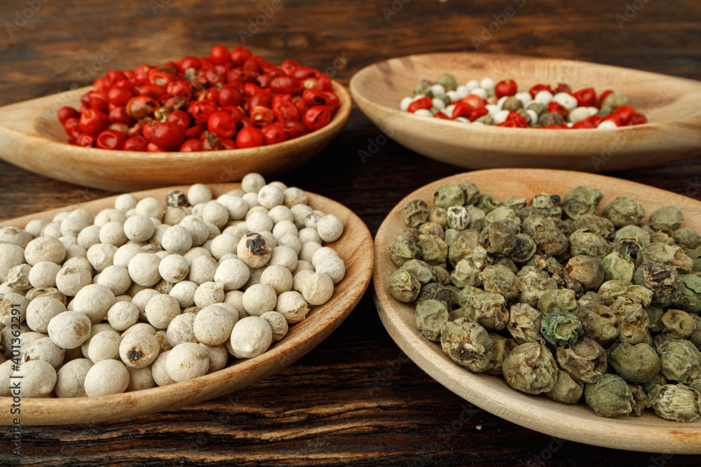 Red, green and white peppercorns spice macro Red, green and white peppercorns spice macro