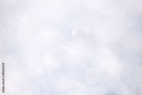 Abstract white glare shine bokeh blurred background