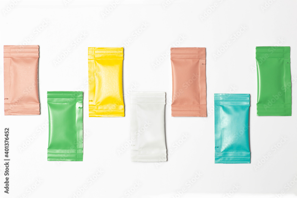 Close-up composition of colored sachets on a white background. Close-up composition of colored sachets on a white background.
