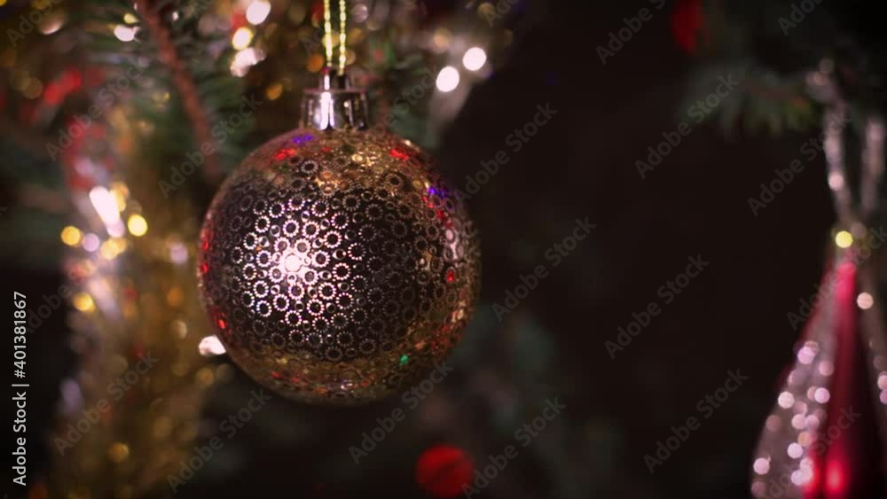 Colorful shiny bauble on the Christmas tree. Colorful shiny bauble on the Christmas tree.