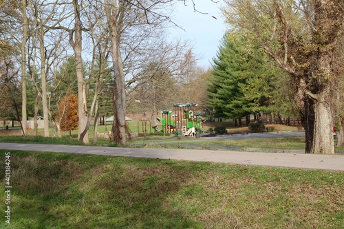 The playground in the park on a sunny day.