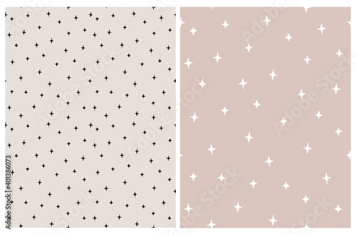 Seamless Hand Drawn Vector Pattern with White and Black Irregular Stars Isolated on a Light Dusty Pink and Warm Gray Background. Cute Abstract Doodle Print ideal for Fabric, Textile.