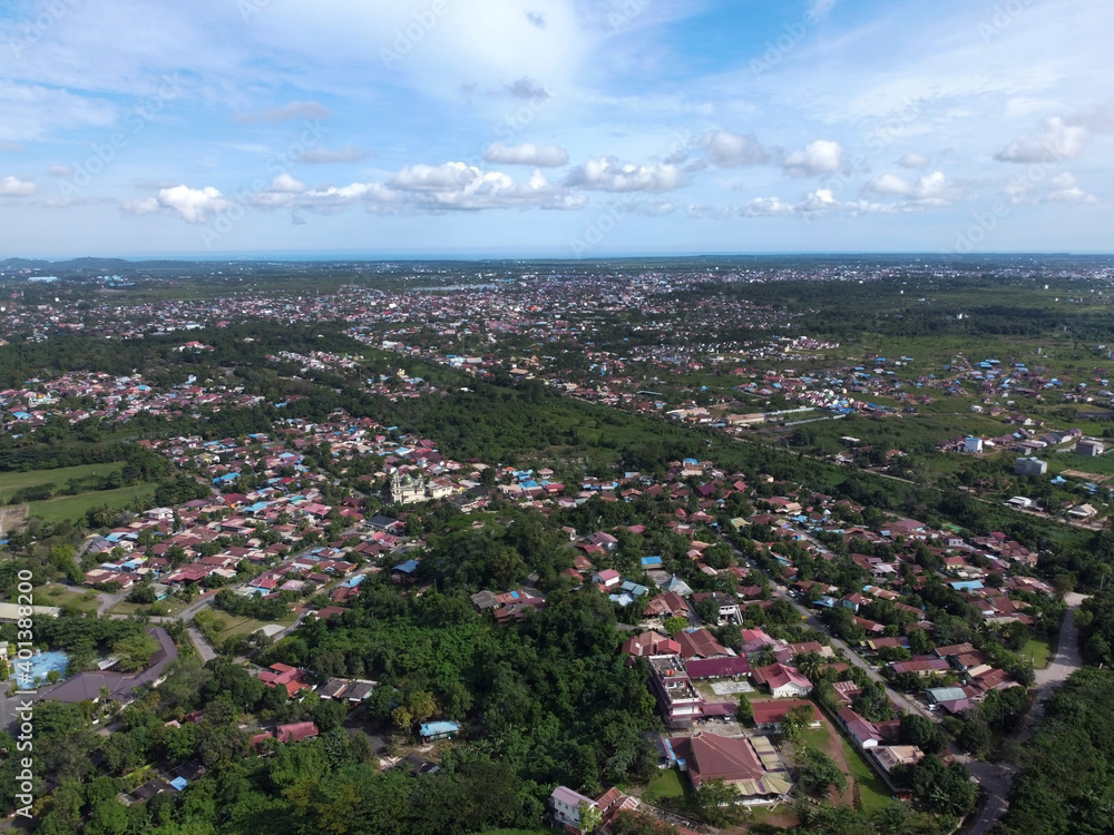 An aerial view of Sangatta city in East Borneo, Indonesia. the picture was taken in October 2021