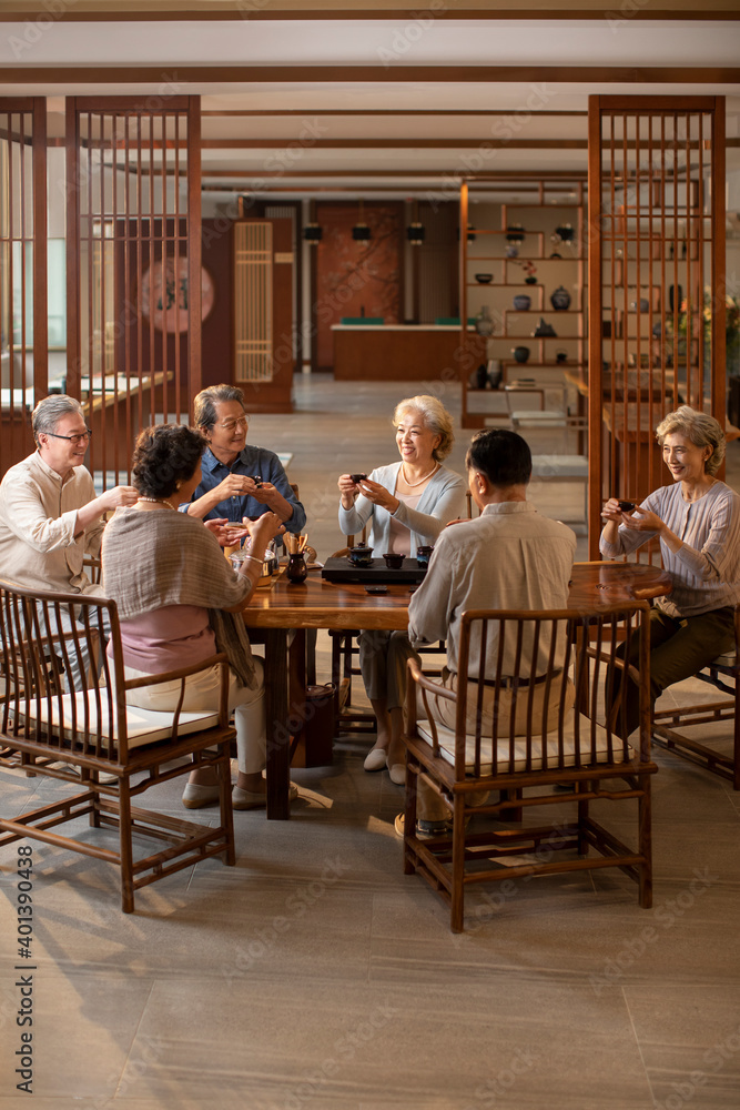 Happy friends drinking tea together Happy friends drinking tea together