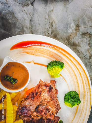 The arrangement of the steak on the plate