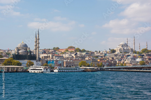 Yeni Camii New Mosque left and Suleymaniye Mosque right in the Fatih district of European Istanbul. Galata Bridge can be seen foreground right