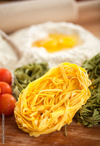 Bologna original Homemade tagliatelle pasta on a cutting board.