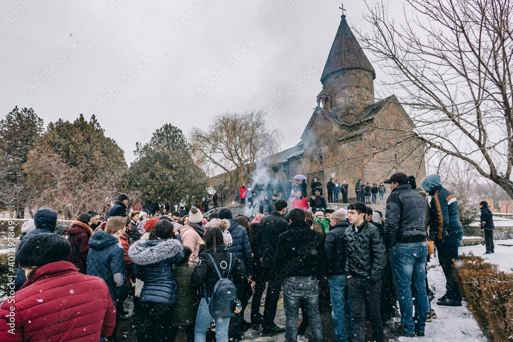 Fototapeta premium Ashtarak, Armenia, Saint Marianeh church, January 14, 2020 - Armenian people celebrating Trndez, celebration of love and faith